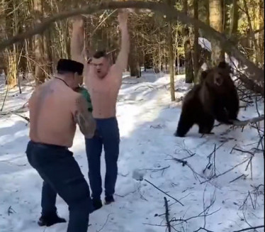 URNEBESNI HIT: Oni treniraju - medved asistira! (VIDEO)