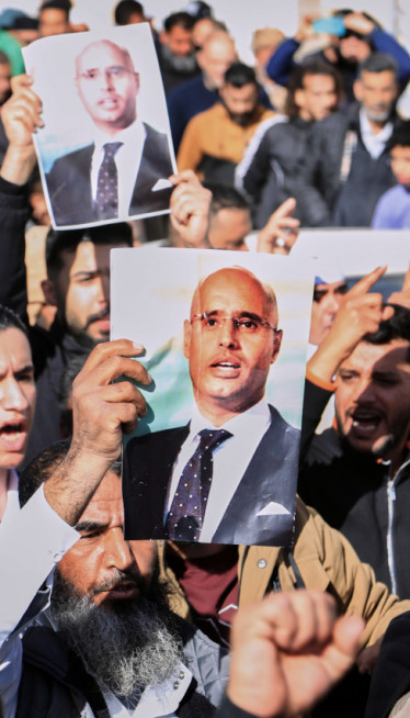 50000 na sahrani Gadafijevog sina! Što imaju ZELENE ZASTAVE?