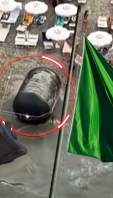 Neobični crni objekat izronio na plaži u IT, kupači u čudu